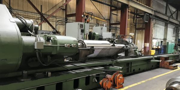 Mill Roll in Grinder